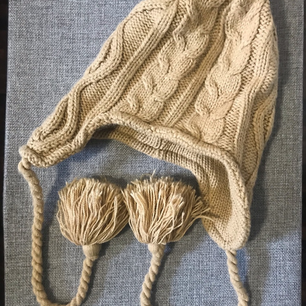 Toque with Tasseled Strings